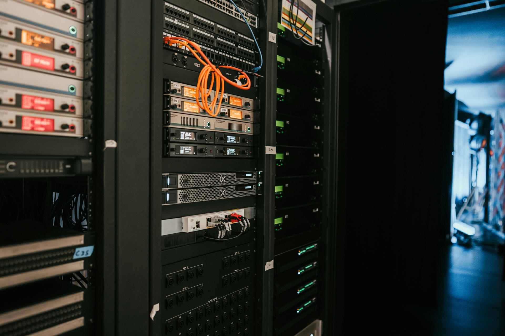 Technician commissioning field hardware at a remote installation site
